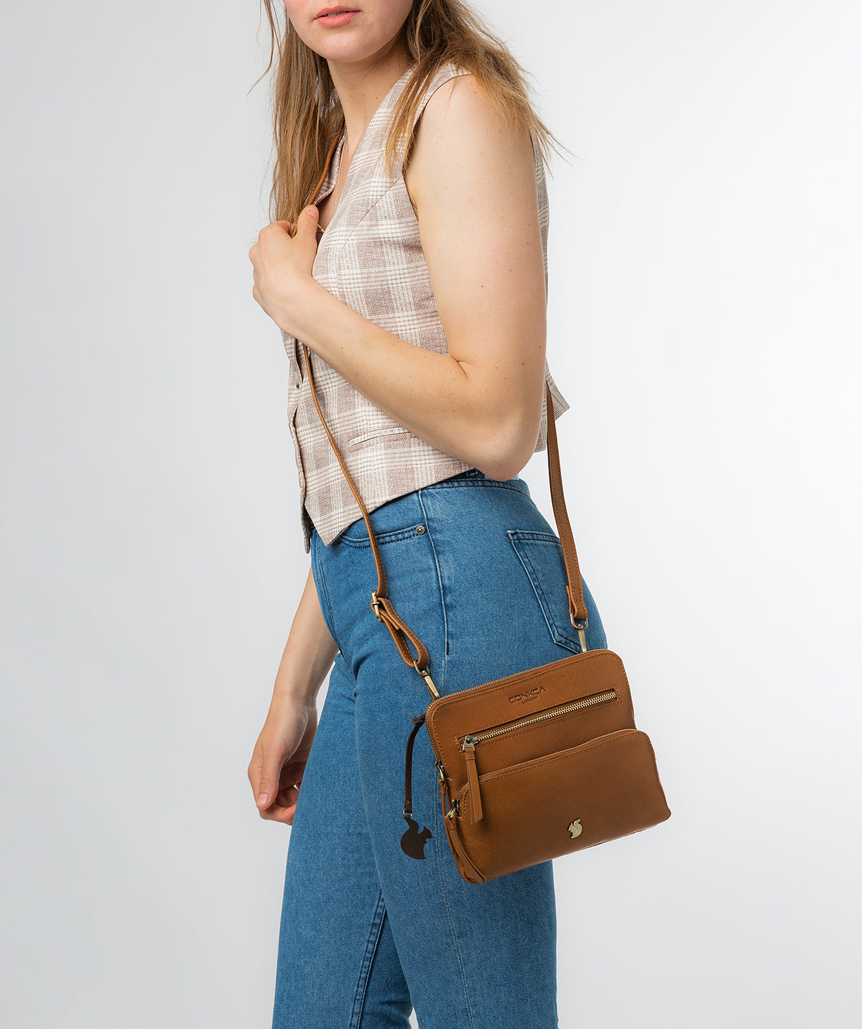 Conkca London Originals Collection Bags: 'Angel' Dark Tan Leather Cross Body Clutch Bag